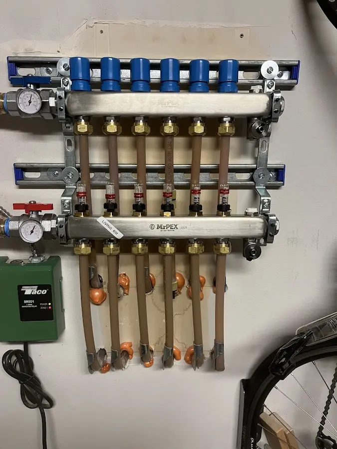 Plumber performing Water Heater Repair at a residential property in Owings Mills